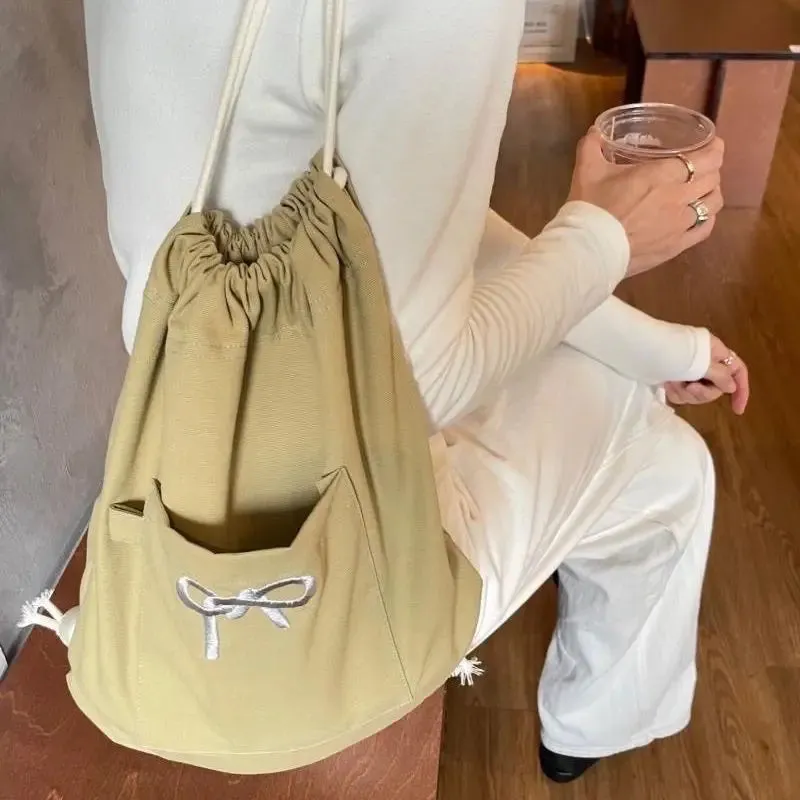 UAKISS  -  2024 Simple Pocket Bow Female Backpacks Y2k Aesthetic All Match Vintage Schoolbags Streetwear Fashion Drawstring Bags for Women
