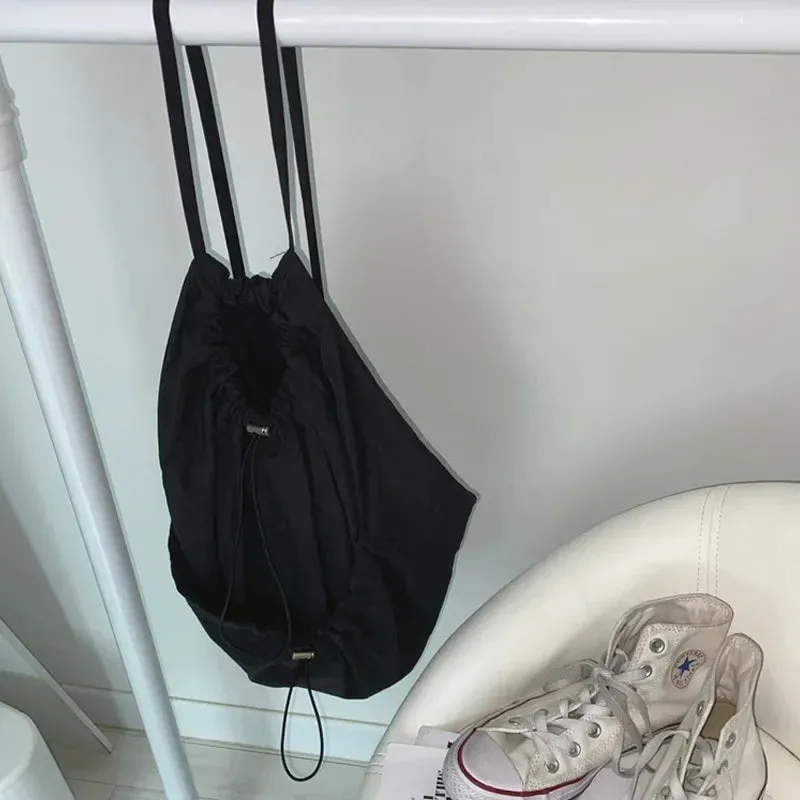 UAKISS  -  Korean Casual Nylon High-capacity Students Backpack Simple All Match Drawstring Pleated Schoolbags Women Vintage Solid Backpacks