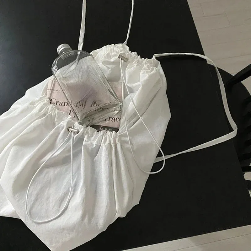 UAKISS  -  Korean Casual Nylon High-capacity Students Backpack Simple All Match Drawstring Pleated Schoolbags Women Vintage Solid Backpacks