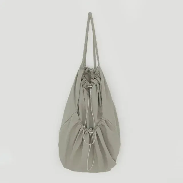 UAKISS  -  Korean Casual Nylon High-capacity Students Backpack Simple All Match Drawstring Pleated Schoolbags Women Vintage Solid Backpacks